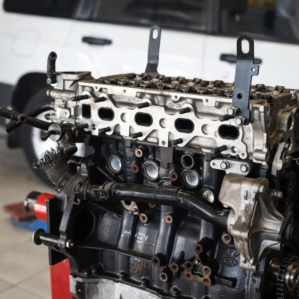 Detail of a car engine in a workshop